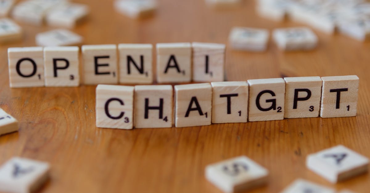 Wooden letter tiles spelling 'OPENAI CHATGPT' on a wooden surface, focused image.
