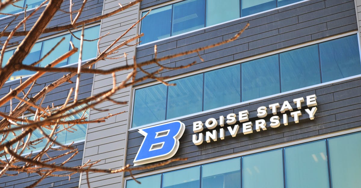 A modern facade of Boise State University showcasing contemporary architecture with a prominent sign.