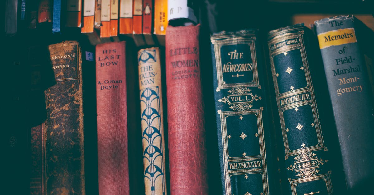 Close-up of a vintage book collection on a wooden shelf, showcasing classic literature.
