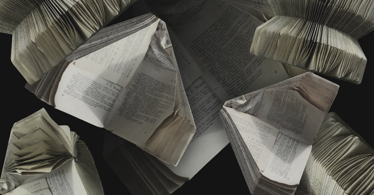 An abstract display of folded vintage books showcasing their pages and textures.