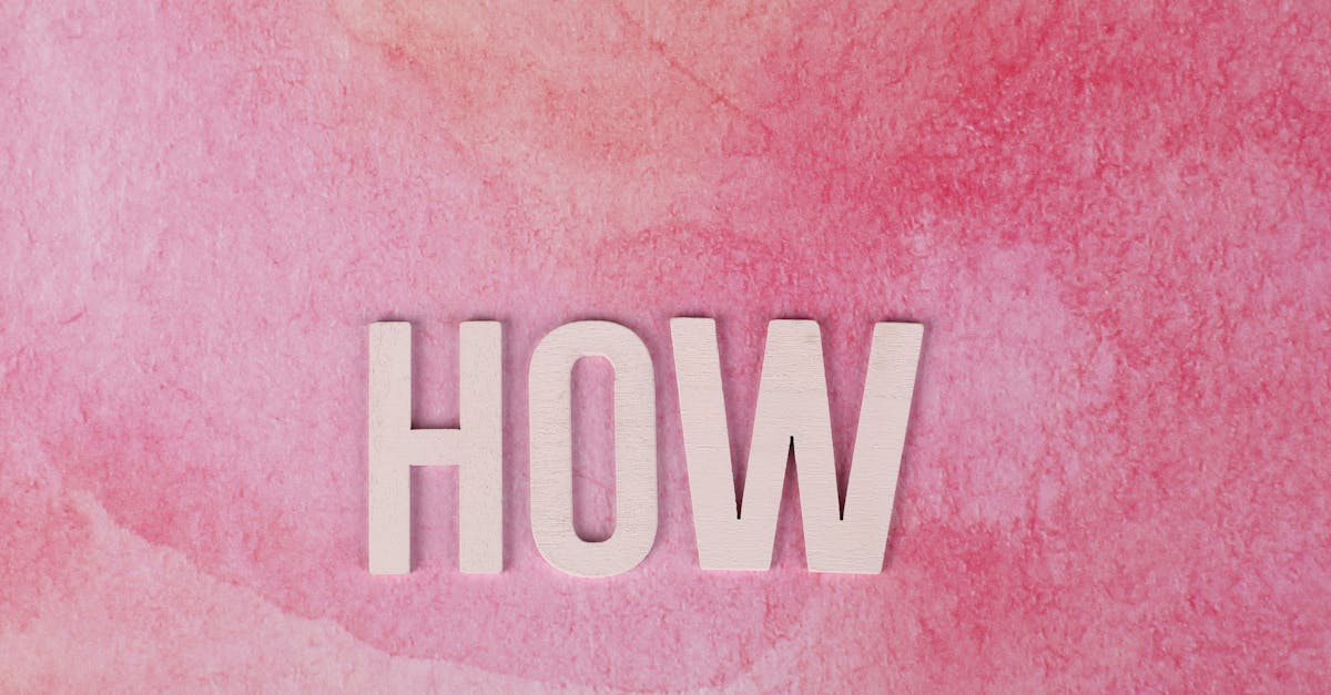 Pink watercolor background featuring the word 'HOW' in bold text for conceptual use.