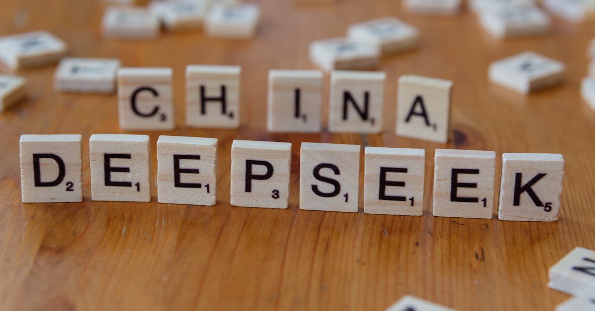 Close-up of wooden Scrabble tiles spelling 'China' and 'Deepseek' on a wooden surface.