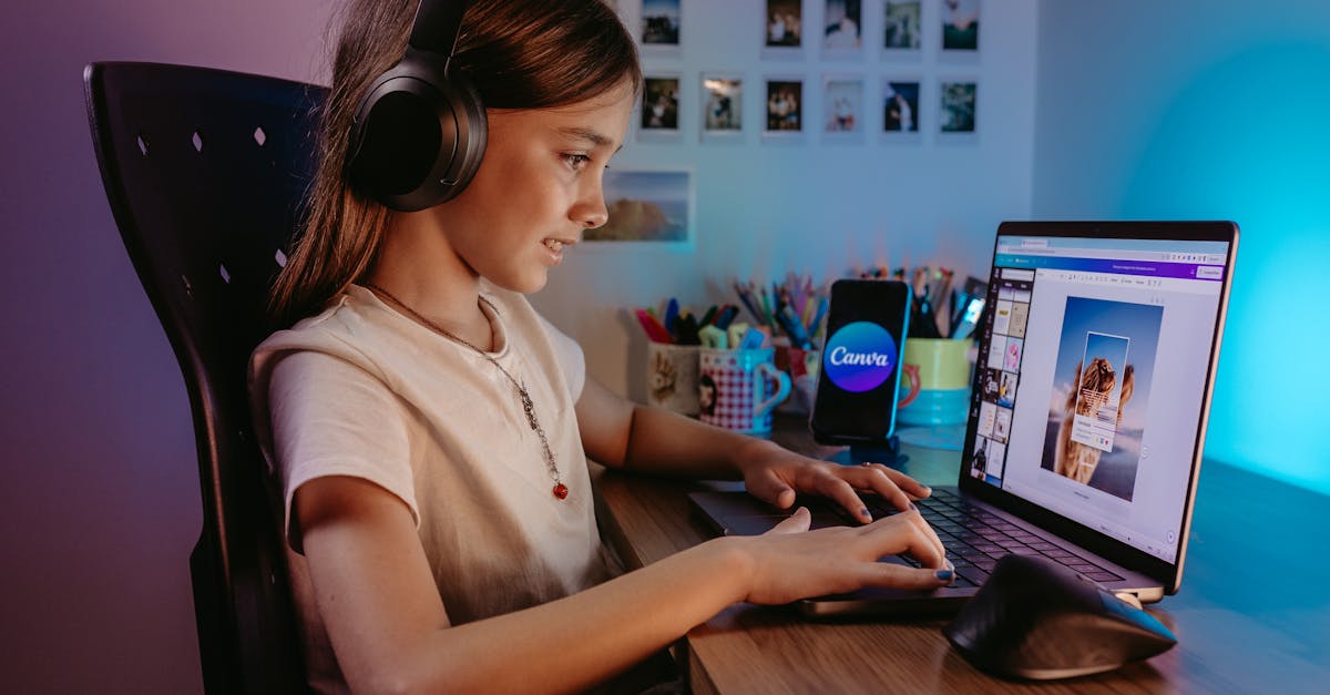 A child using a laptop for creative education with colorful background.