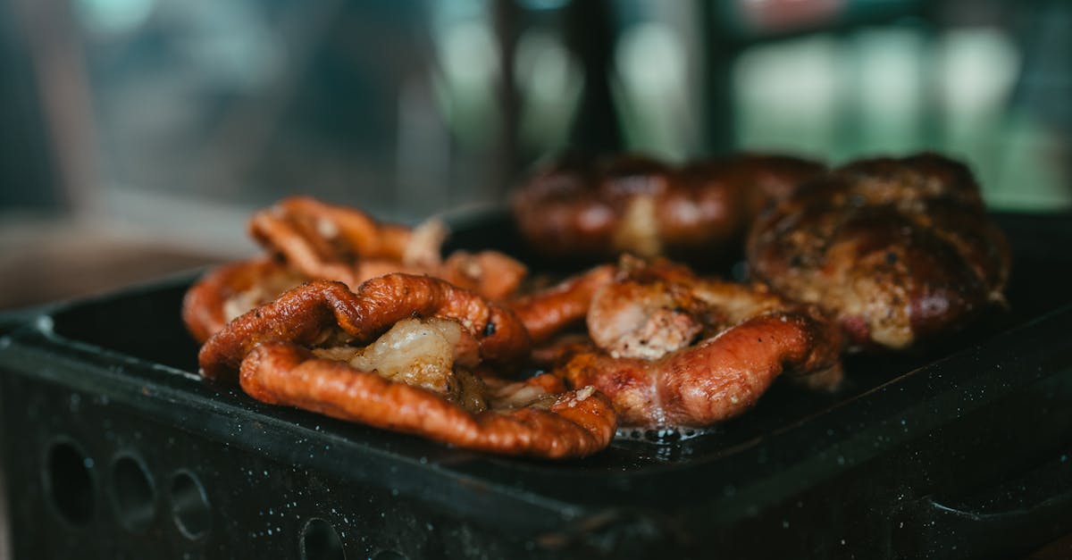 Close-up of traditional Argentine asado featuring grilled chorizo and meat in Uribelarrea, Argentina.