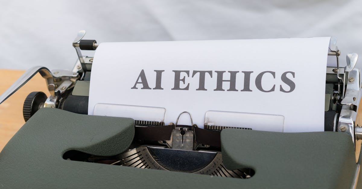Close-up of vintage typewriter with 'AI ETHICS' typed on paper, emphasizing technology and responsibility.
