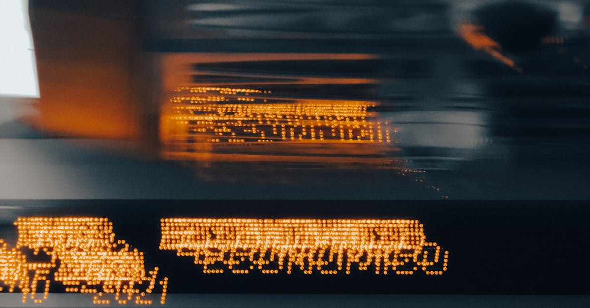 Blurred LED lights display abstract text in motion, creating an artistic effect.
