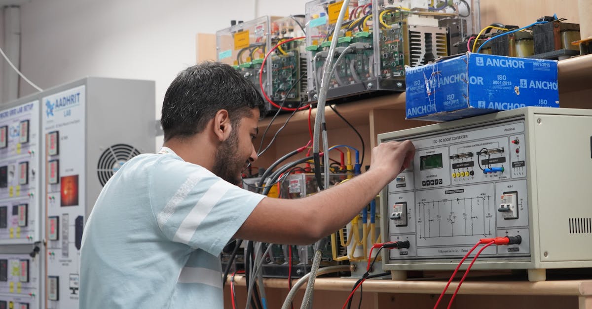 Engineer adjusting equipment in an advanced research lab setting.