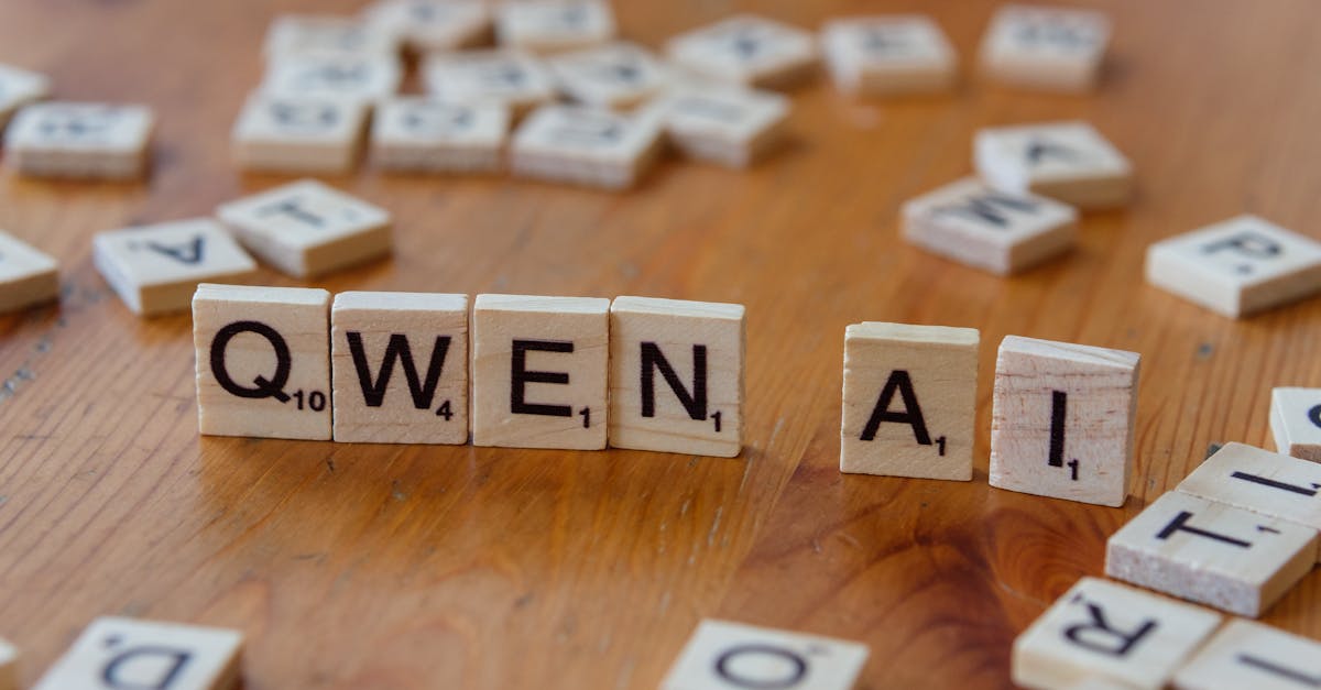 Scrabble-like tiles arranged to spell 'Qwen AI' on a wooden surface, depicting technology concepts.